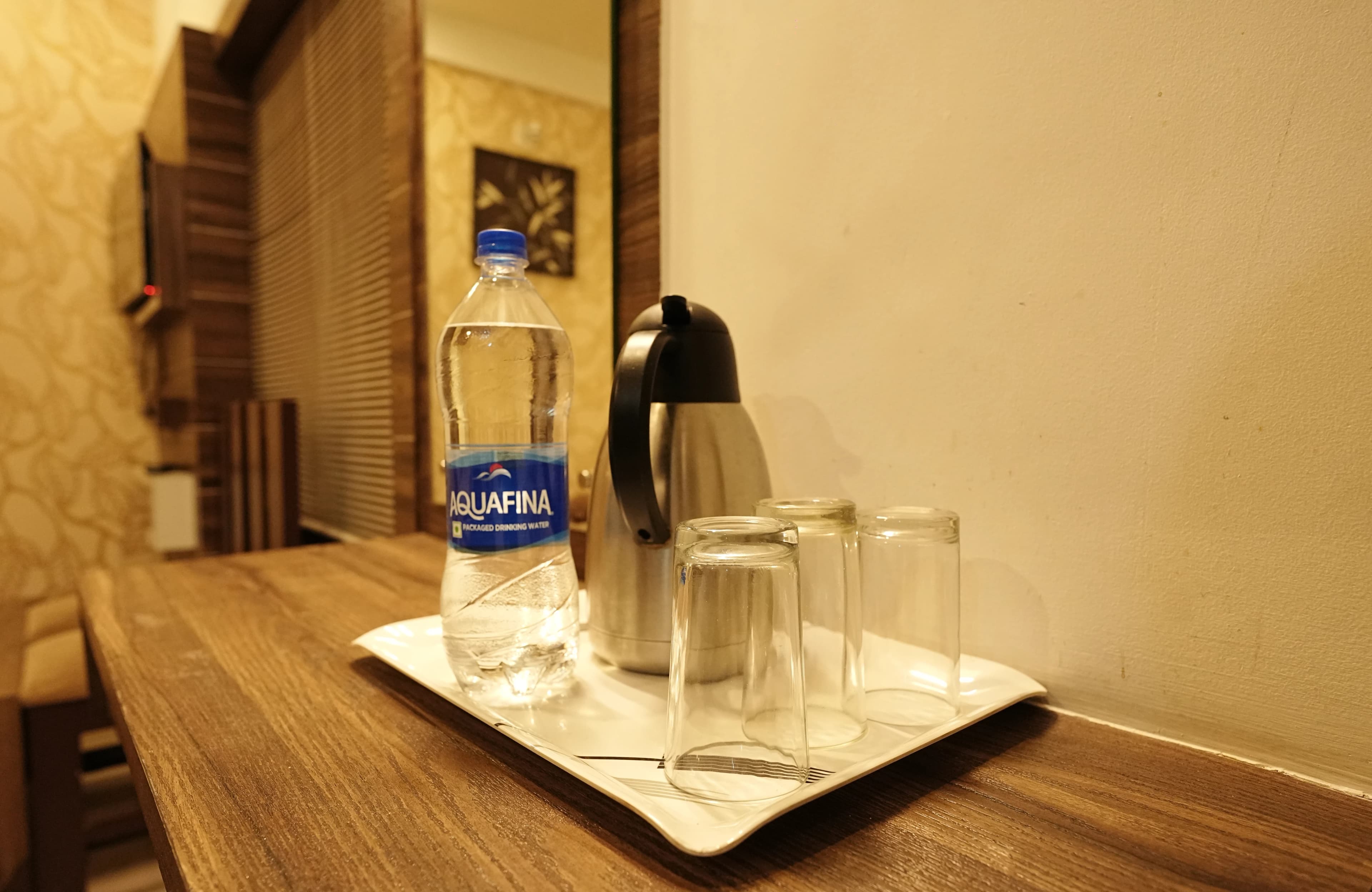 Daylit glass window area in Affas Udupi Hotel guest room